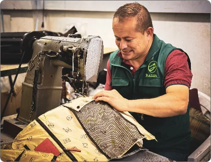 Leather operator working in the Balsa workshop